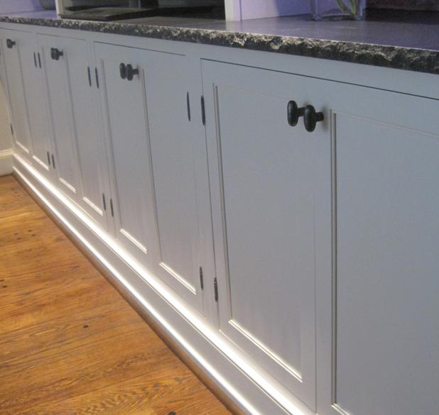 Painted Custom cabinets, brushed granite, reclaimed wood backsplash, wire management, LED lighting